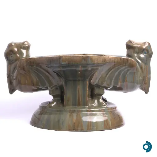 Roger GUERIN (1896 - 1954), jardinière aux pélicans stylisés, circa 1925, moulage en grès émaillé cuisson au sel, 22.5 x 40 x 20 cm.   Signature en creux sous la base « Grès d’Art Guérin 754 ». 